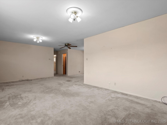 123 S Madison Blvd, Bartlesville, OK 74006 - empty room with carpet floors and ceiling fan