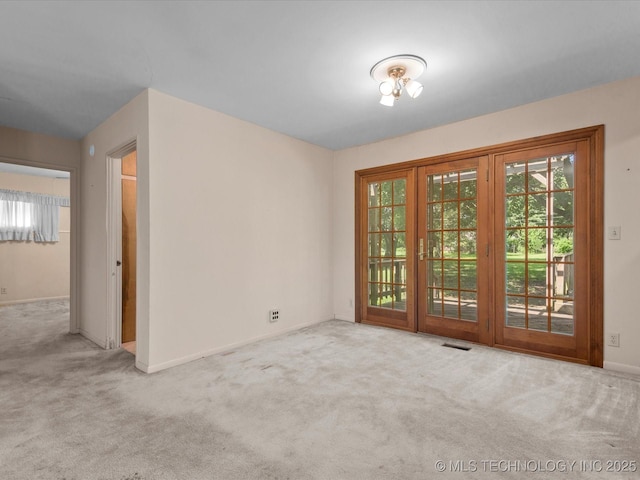 123 S Madison Blvd, Bartlesville, OK 74006 - carpeted empty room with baseboards
