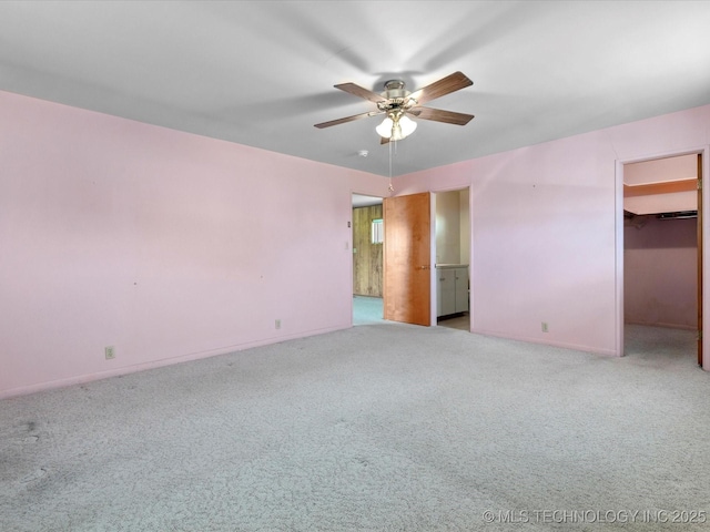 123 S Madison Blvd, Bartlesville, OK 74006 - unfurnished room featuring a ceiling fan and carpet floors