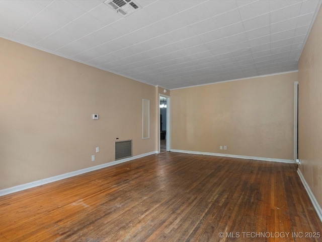 105 E Brahma Ave, Dewey, OK 74029 - empty room featuring wood-type flooring and ornamental molding