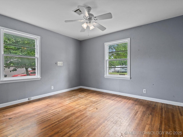 105 E Brahma Ave, Dewey, OK 74029 - unfurnished room featuring hardwood / wood-style flooring and a ceiling fan