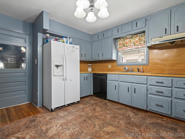 105 E Brahma Ave, Dewey, OK 74029 - kitchen featuring white fridge with ice dispenser, black dishwasher, a chandelier, gray cabinets, and light countertops