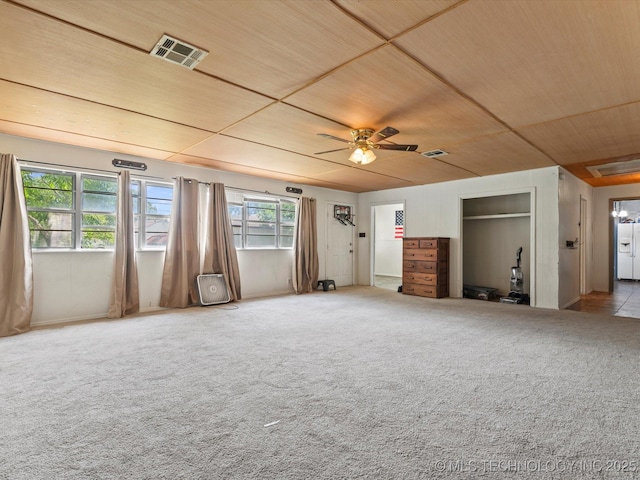 105 E Brahma Ave, Dewey, OK 74029 - carpeted spare room with wood ceiling and a ceiling fan