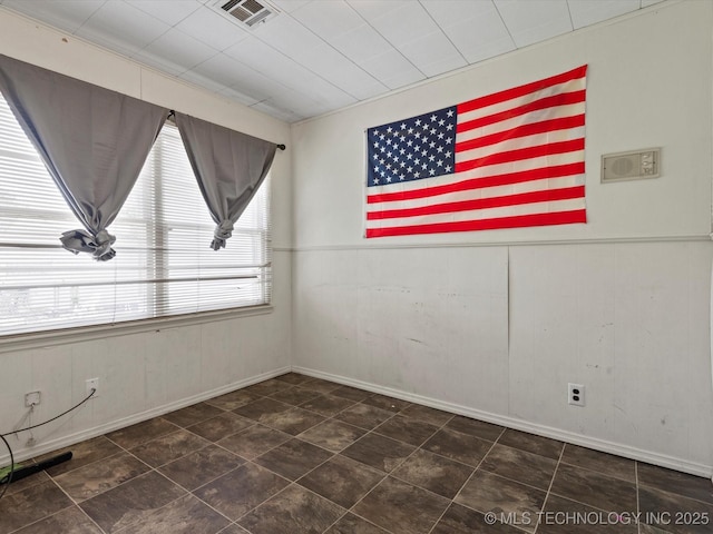 105 E Brahma Ave, Dewey, OK 74029 - spare room featuring tile patterned flooring