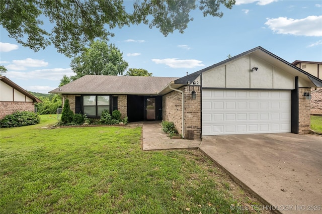 612 S 5th St, Eufaula, OK 74432 - single story home featuring brick siding, an attached garage, concrete driveway, and a front lawn