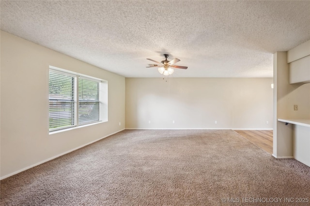 612 S 5th St, Eufaula, OK 74432 - carpeted spare room with a ceiling fan and a textured ceiling