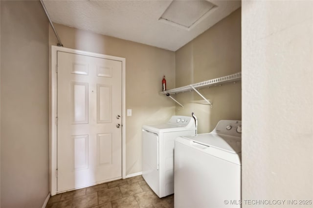 612 S 5th St, Eufaula, OK 74432 - washroom with washing machine and dryer and baseboards