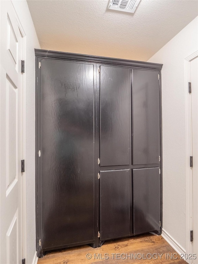 3404 N Birch, Mcalester, OK 74501 - detailed view of wood finished floors and baseboards