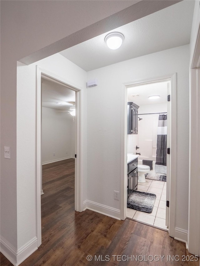 3404 N Birch, Mcalester, OK 74501 - hall with wood finished floors and baseboards