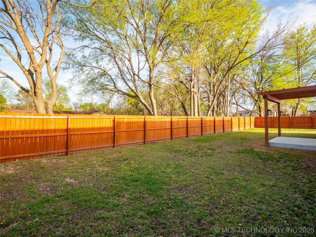 3404 N Birch, Mcalester, OK 74501 - fenced backyard with a patio