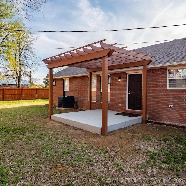 3404 N Birch, Mcalester, OK 74501 - back of house with a patio, a pergola, roof with shingles, and brick siding