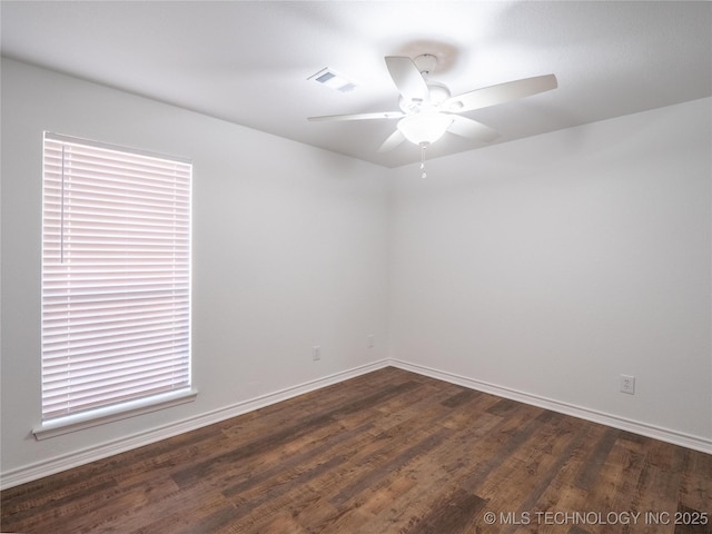 3404 N Birch, Mcalester, OK 74501 - unfurnished room featuring ceiling fan and dark wood-style flooring