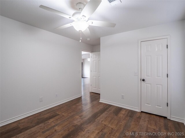 3404 N Birch, Mcalester, OK 74501 - unfurnished bedroom featuring dark wood-style floors and ceiling fan