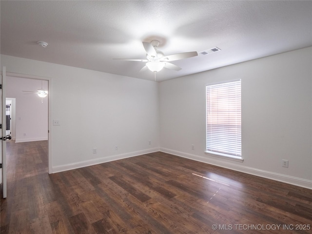 3404 N Birch, Mcalester, OK 74501 - unfurnished room featuring a ceiling fan, dark wood-type flooring, and a smoke detector