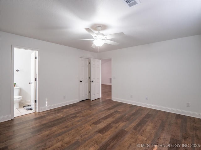 3404 N Birch, Mcalester, OK 74501 - unfurnished bedroom featuring dark wood finished floors and ensuite bath