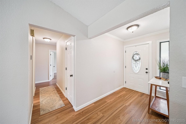 11017 E 98th St N, Owasso, OK 74055 - foyer with light wood-style floors, crown molding, and a textured wall