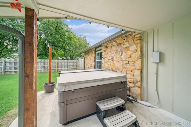 11017 E 98th St N, Owasso, OK 74055 - view of patio / terrace with a hot tub