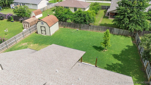 11017 E 98th St N, Owasso, OK 74055 - fenced backyard with a storage unit