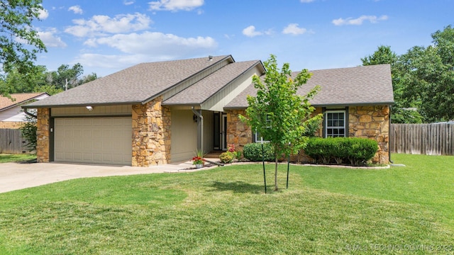 11017 E 98th St N, Owasso, OK 74055 - view of front of home with stone siding, a garage, concrete driveway, and roof with shingles