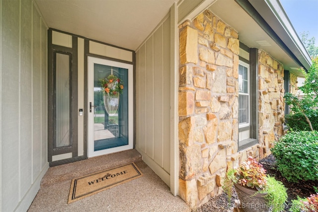 11017 E 98th St N, Owasso, OK 74055 - view of exterior entry with stone siding