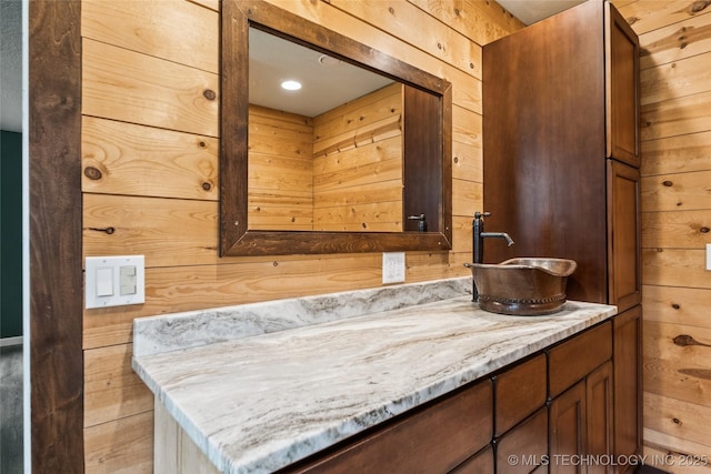 6103 S 223rd E Ave, Broken Arrow, OK 74014 - bathroom with vanity and wooden walls