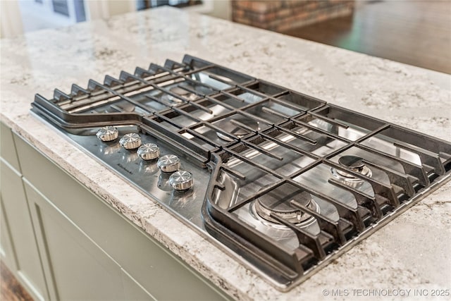 6103 S 223rd E Ave, Broken Arrow, OK 74014 - kitchen view of stainless steel gas stovetop and light stone counters