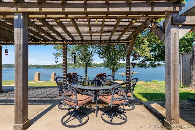 61112 E 310, Grove, OK 74344 - view of patio featuring a pergola, a water view, and outdoor dining area