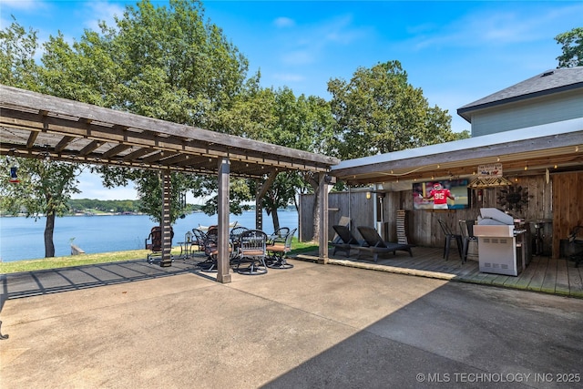 61112 E 310, Grove, OK 74344 - view of patio / terrace with area for grilling and a water view