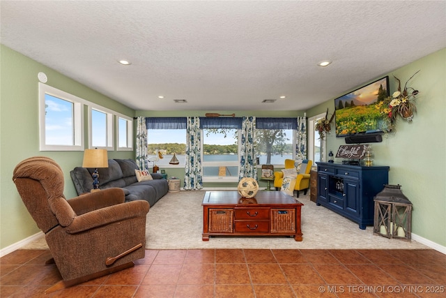 61112 E 310, Grove, OK 74344 - tiled living area with a textured ceiling, recessed lighting, and carpet flooring