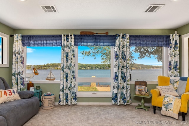 61112 E 310, Grove, OK 74344 - sitting room featuring carpet floors and a water view