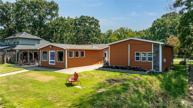61112 E 310, Grove, OK 74344 - back of property featuring a patio area