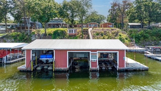 61112 E 310, Grove, OK 74344 - dock featuring boat lift and a water view
