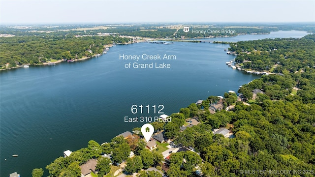 61112 E 310, Grove, OK 74344 - aerial view of a large body of water and a heavily wooded area