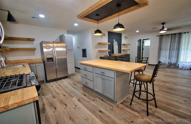 1424 E Okmulgee St, Muskogee, OK 74403 - kitchen featuring butcher block counters, stainless steel fridge with ice dispenser, open shelves, gray cabinets, and recessed lighting