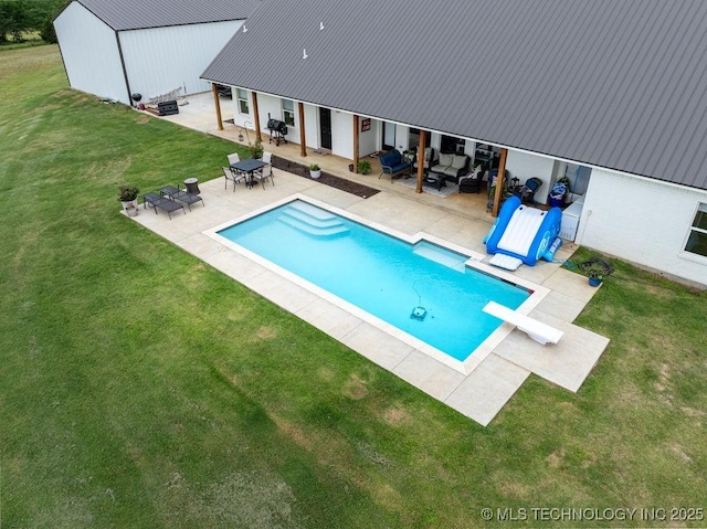 8486 Mcduffee Rd, Kingston, OK 73439 - outdoor pool featuring an outdoor hangout area, a lawn, a patio area, and a diving board