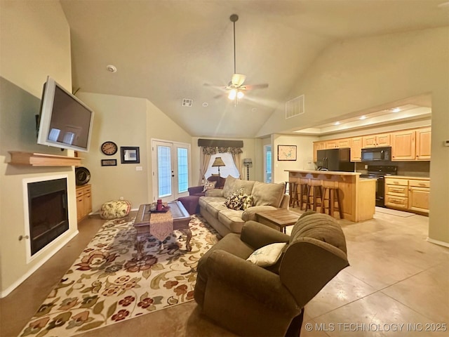 1908 Rhynes-Childress Loop, Kingston, OK 73439 - living area featuring a ceiling fan, a fireplace, high vaulted ceiling, and french doors