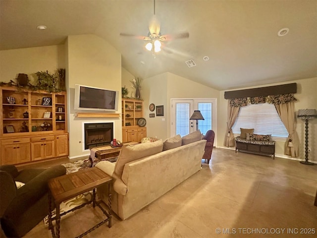1908 Rhynes-Childress Loop, Kingston, OK 73439 - living area with ceiling fan, lofted ceiling, a fireplace with raised hearth, and finished concrete floors