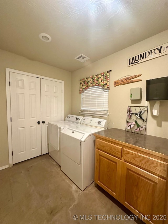 1908 Rhynes-Childress Loop, Kingston, OK 73439 - laundry area featuring separate washer and dryer and cabinet space