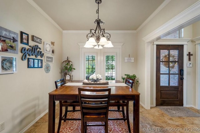 14404 S Florence Ave, Bixby, OK 74008 - dining space featuring a chandelier and crown molding