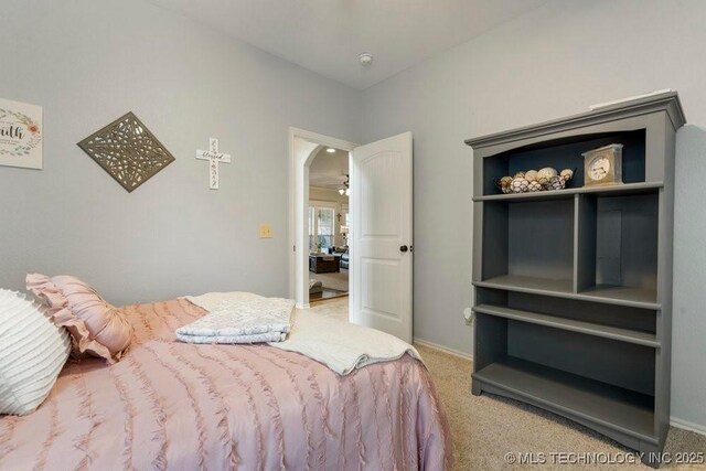 14404 S Florence Ave, Bixby, OK 74008 - carpeted bedroom featuring baseboards
