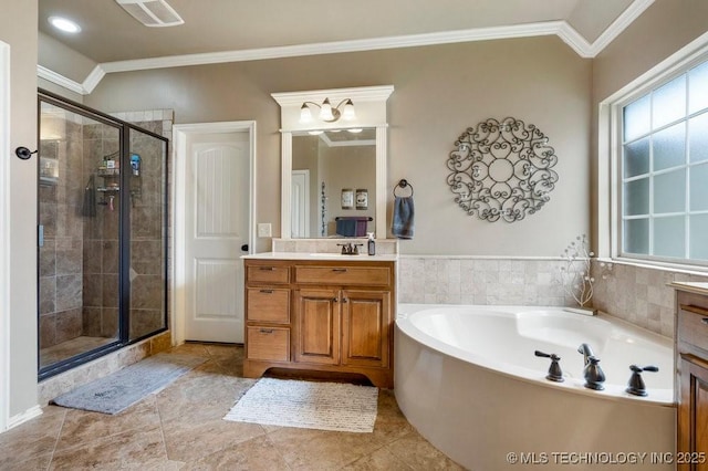 14404 S Florence Ave, Bixby, OK 74008 - full bathroom with vanity, a bath, a stall shower, ornamental molding, and tile patterned flooring