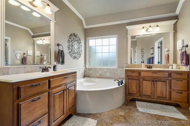 14404 S Florence Ave, Bixby, OK 74008 - bathroom with two vanities, a bath, and crown molding
