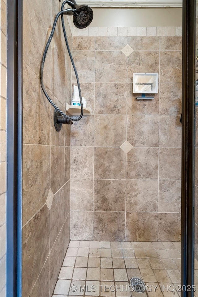 14404 S Florence Ave, Bixby, OK 74008 - bathroom featuring a tile shower