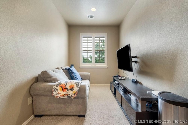 14404 S Florence Ave, Bixby, OK 74008 - carpeted living area with baseboards and a textured wall
