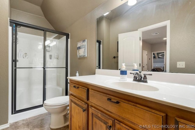14404 S Florence Ave, Bixby, OK 74008 - bathroom with a shower stall, vanity, tile patterned flooring, vaulted ceiling, and a textured wall