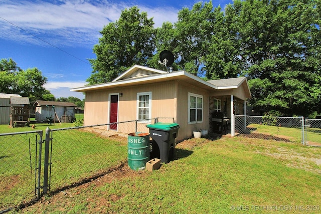 1518 E Hogner St, Tahlequah, OK 74464 - view of side of property featuring a gate