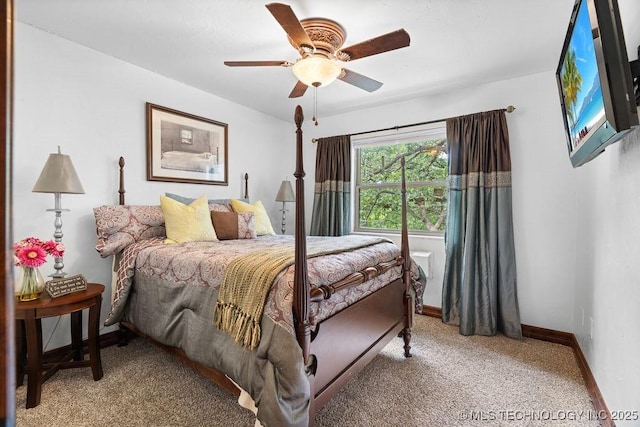 9094 Waters Edge, Kingston, OK 73439 - bedroom with light carpet and ceiling fan
