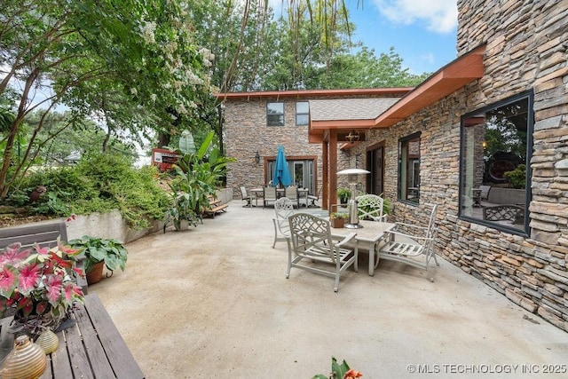 9094 Waters Edge, Kingston, OK 73439 - view of patio with outdoor dining space