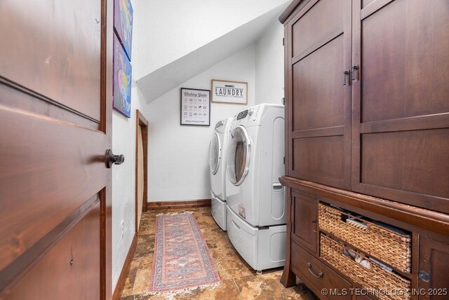 9094 Waters Edge, Kingston, OK 73439 - laundry area featuring washer and clothes dryer and stone finish flooring