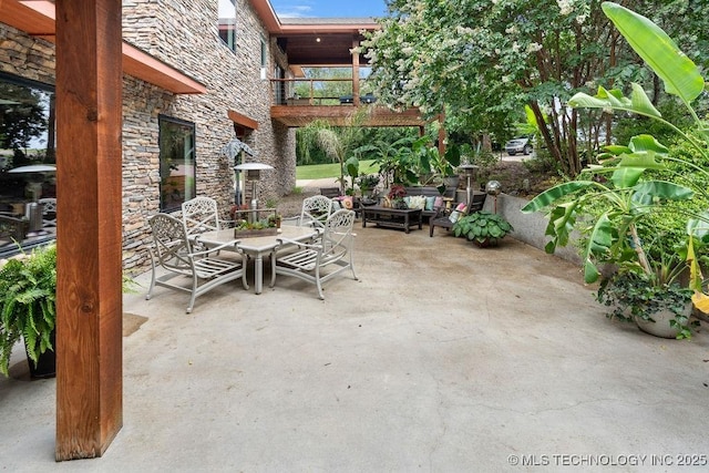 9094 Waters Edge, Kingston, OK 73439 - patio / terrace with a patio area and an outdoor hangout area